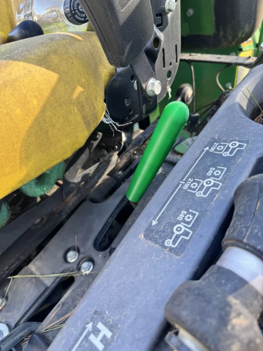 Photo or a PTO extension lever for John Deere Compact tractors