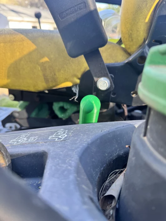 Photo or a PTO extension lever for John Deere Compact tractors