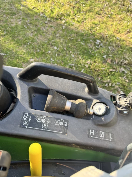 Photo or a PTO extension lever for John Deere Compact tractors