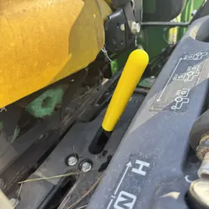 JD-PTO-YL Photo or a PTO extension lever for John Deere Compact tractors